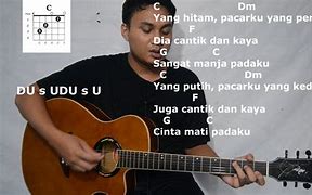 Chord Lagu Hitam Bukan Putih